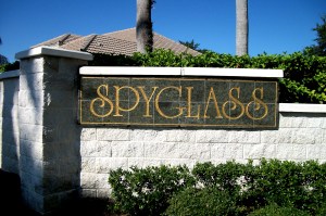 Gold inlay on tile signs at entrance to community in Trinity FL